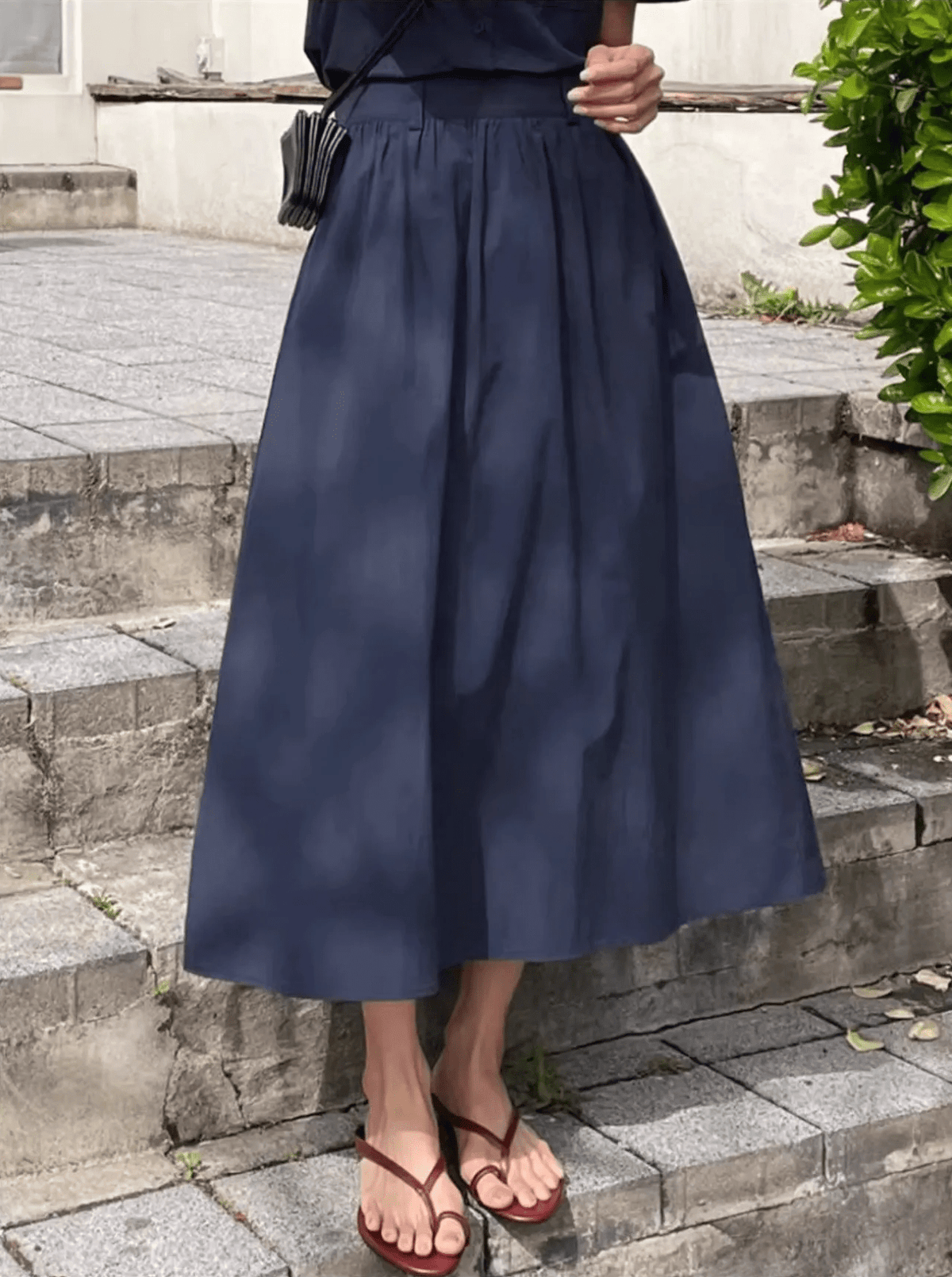Lucy – Leichte, flache Zehentrenner-Slipper