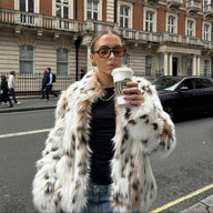 Cappotto leopardato aperto in pelliccia sintetica