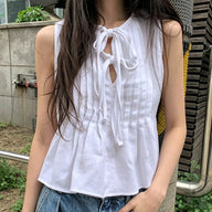 Blusa Carmen con volant al fondo e laccio sul davanti