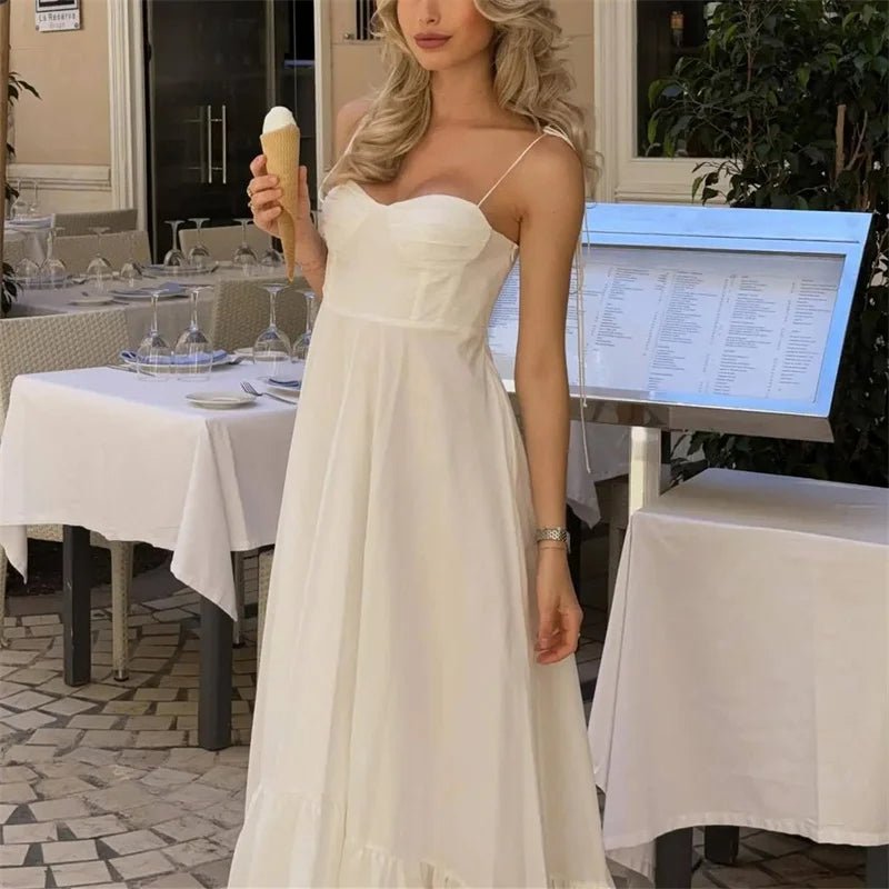 Robe midi fluide à taille haute et volants