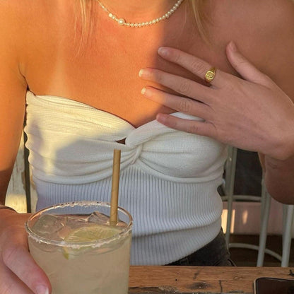 Top corto senza spalline a taglio off-shoulder